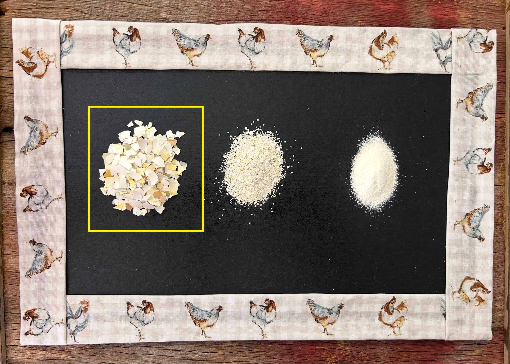Three variations of eggshells on a black surface with decorative chicken patterned border