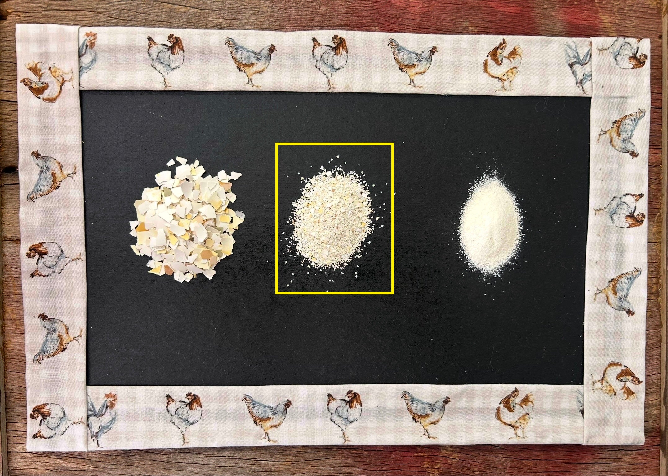 Three types of eggshells on a black surface with decorative chicken patterned border
